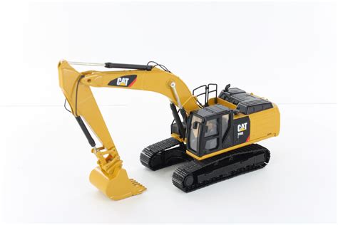 mini excavator diecast model|diecast cat excavators.